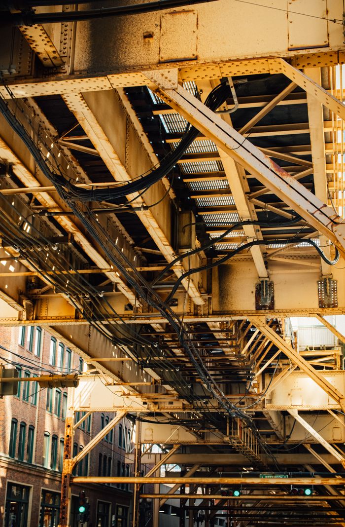 Mastering the First Impression: Your intriguing post title goes here Detailed view of Chicago's iconic elevated train tracks showcasing industrial architecture.